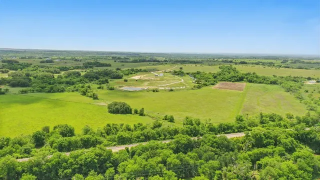a view of a lake with a big yard