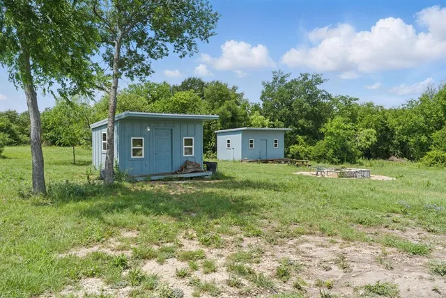 a house view with a garden space
