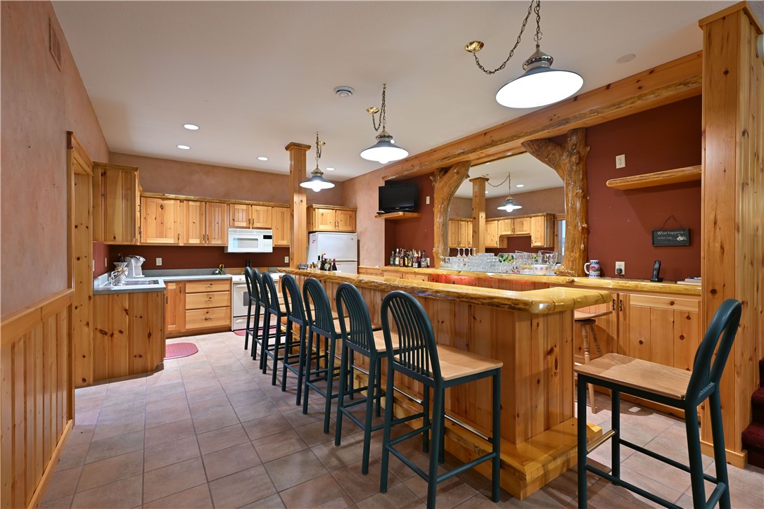 23165 Garmisch Road, Unit 23 Cable, WI 54821 - Photo 32 of 60 Full Wet Bar