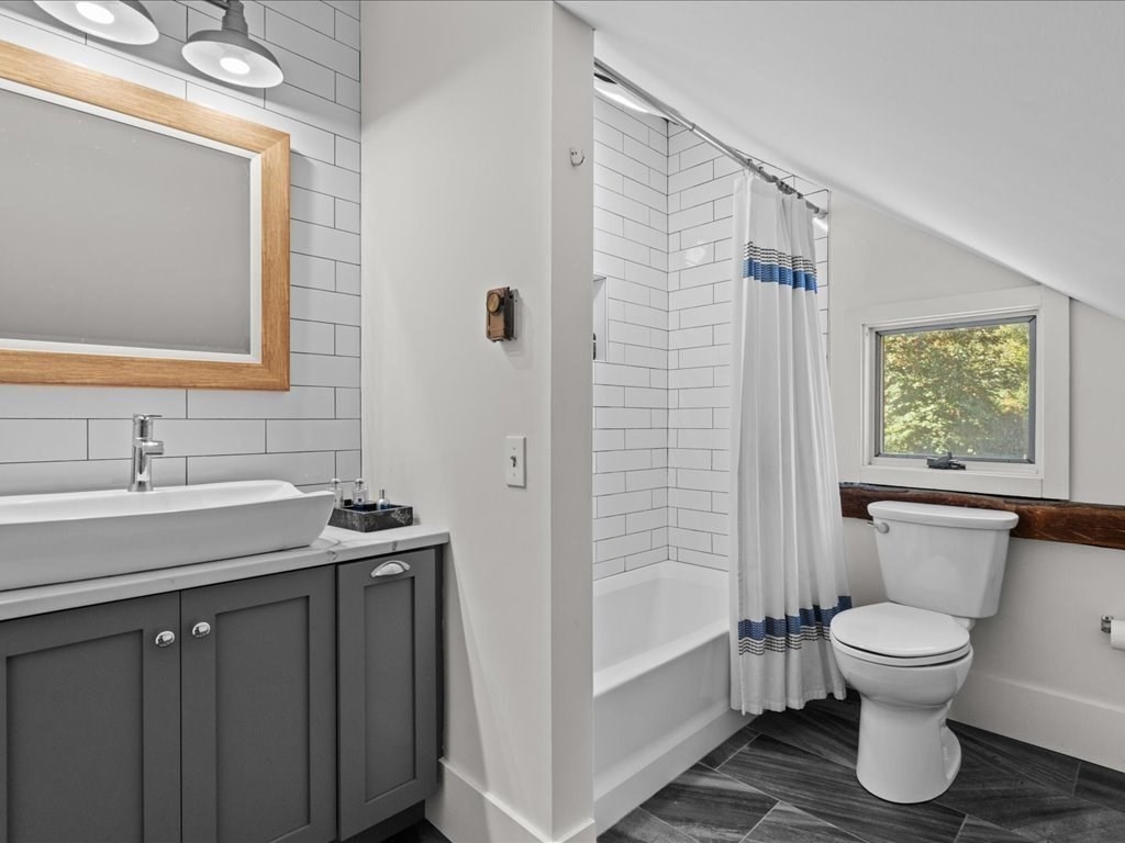 144 Old County Road Sandwich, MA 02537 - Photo 26 of 42 a bathroom with a sink toilet and shower