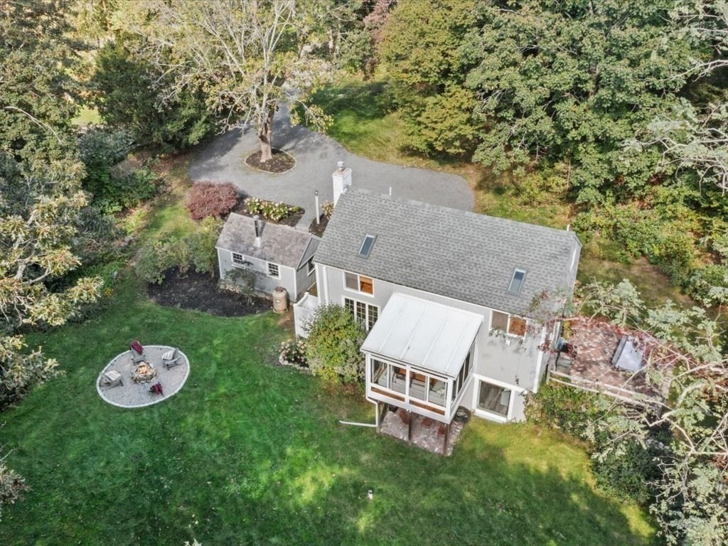 144 Old County Road Sandwich, MA 02537 - Photo 34 of 42 an aerial view of a house with table and chairs