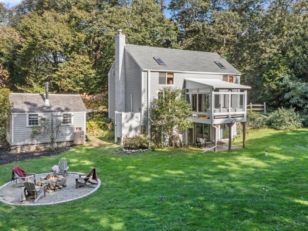 144 Old County Road Sandwich, MA 02537 - Photo 36 of 42 a house with a garden and yard