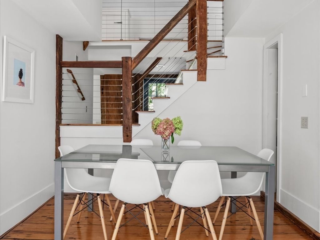 144 Old County Road Sandwich, MA 02537 - Photo 5 of 42 a view of a dining room with furniture and wooden floor