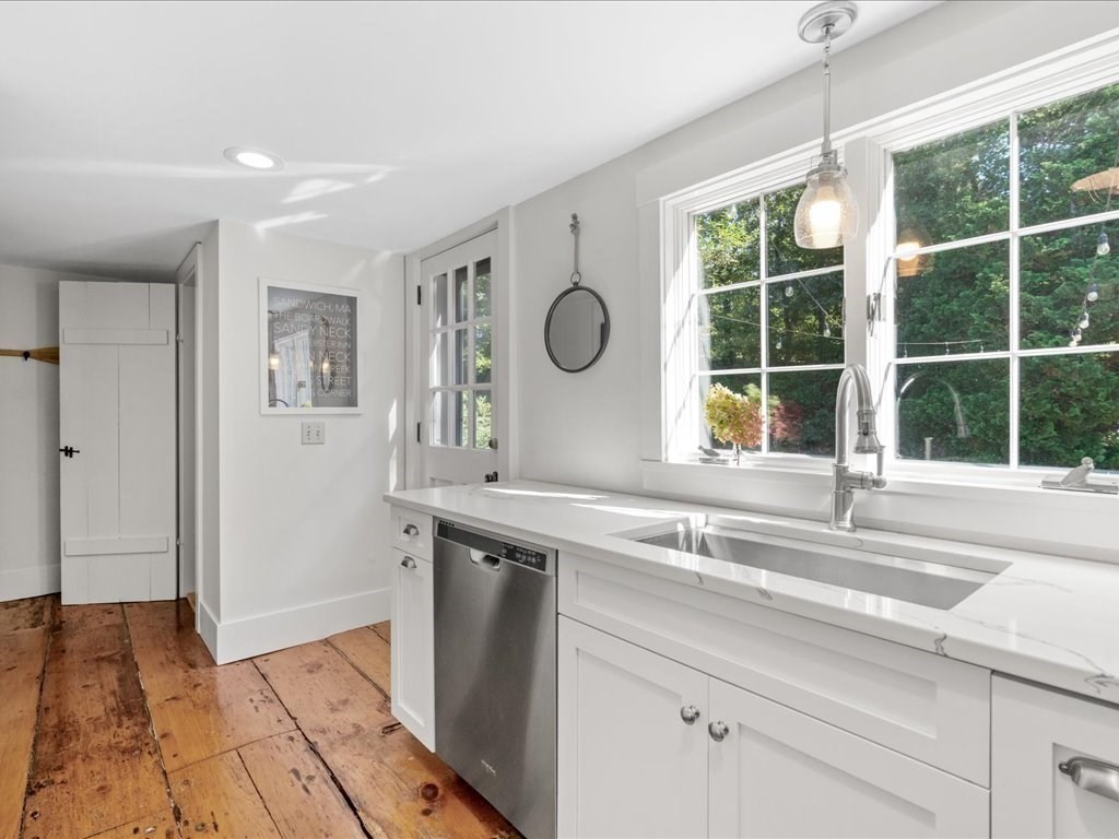 144 Old County Road Sandwich, MA 02537 - Photo 10 of 42 a kitchen with a sink and a window