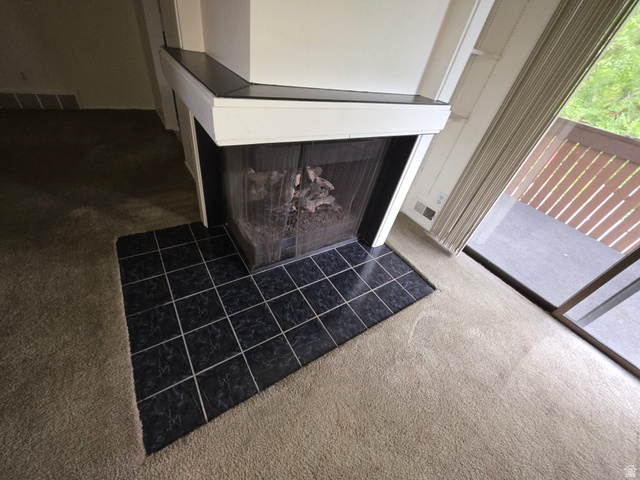 6852 Countrywoods Circle, Unit 5D Midvale, UT 84047 - Photo 13 of 50 Gas fireplace with tile sill.