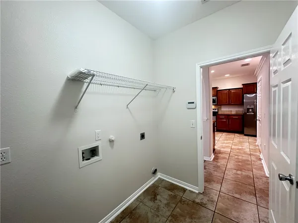 a view of a hallway with closet