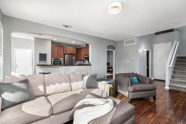 a living room with furniture and a couch