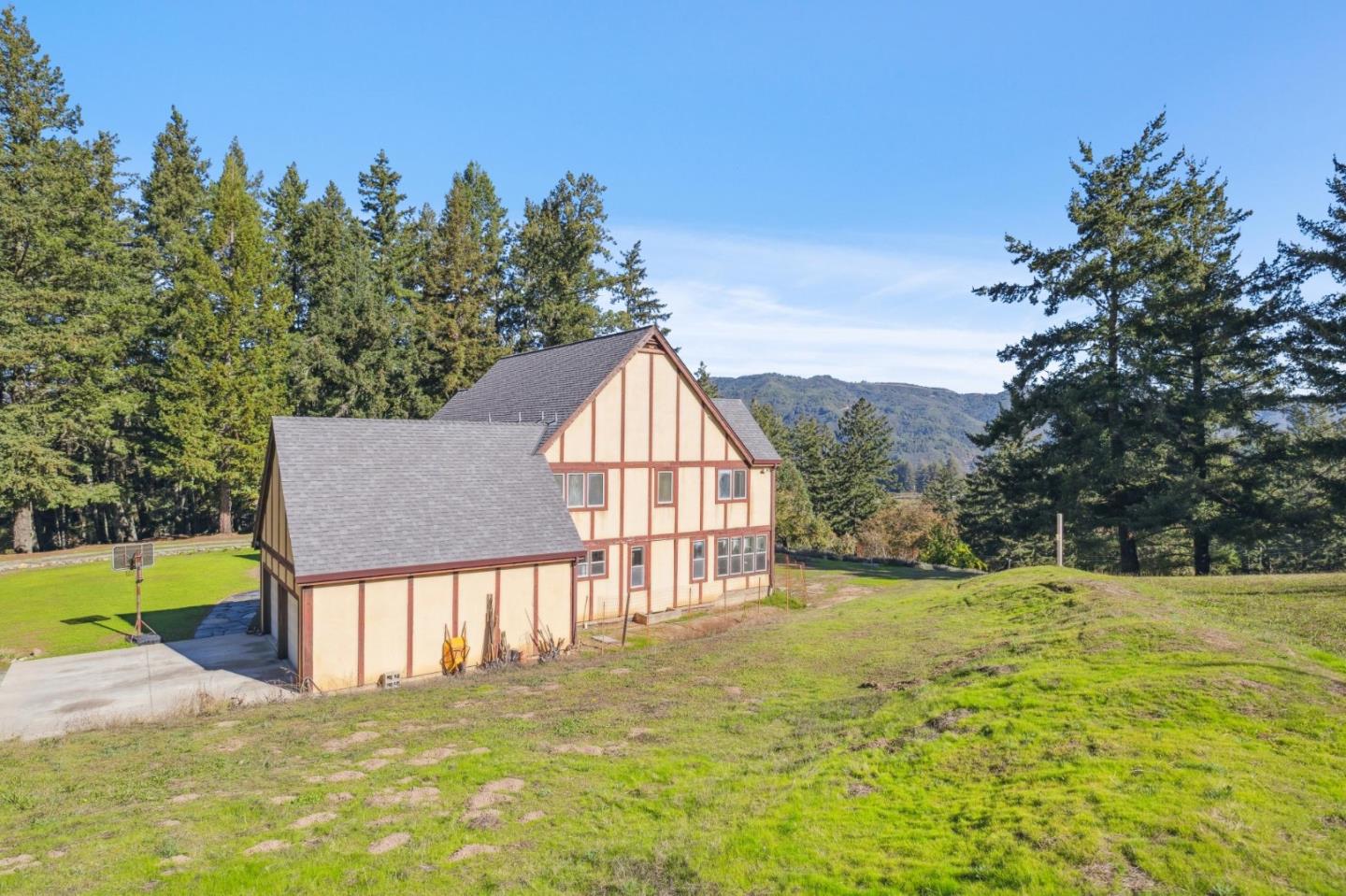 24595 Skyland Road Los Gatos, CA 95033 - Photo 14 of 68 a view of a house with a yard