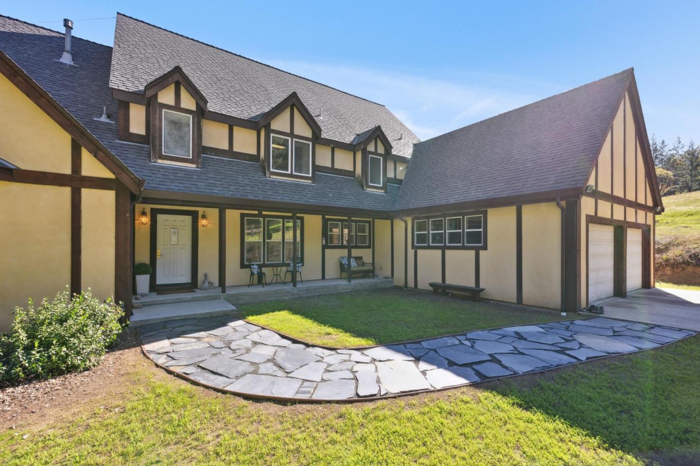 24595 Skyland Road Los Gatos, CA 95033 - Photo 15 of 68 a front view of a house having yard