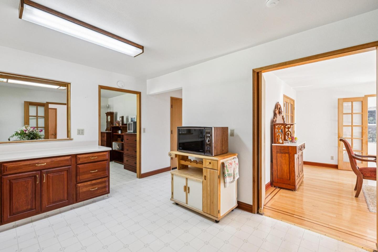 24595 Skyland Road Los Gatos, CA 95033 - Photo 34 of 68 a view of a living room with furniture and flat screen tv