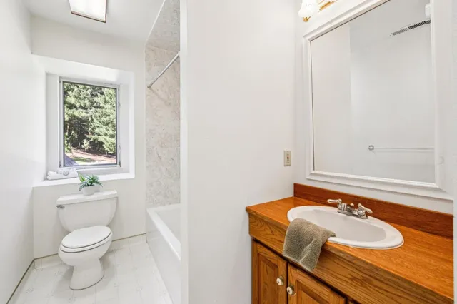 a view of swimming pool with trees