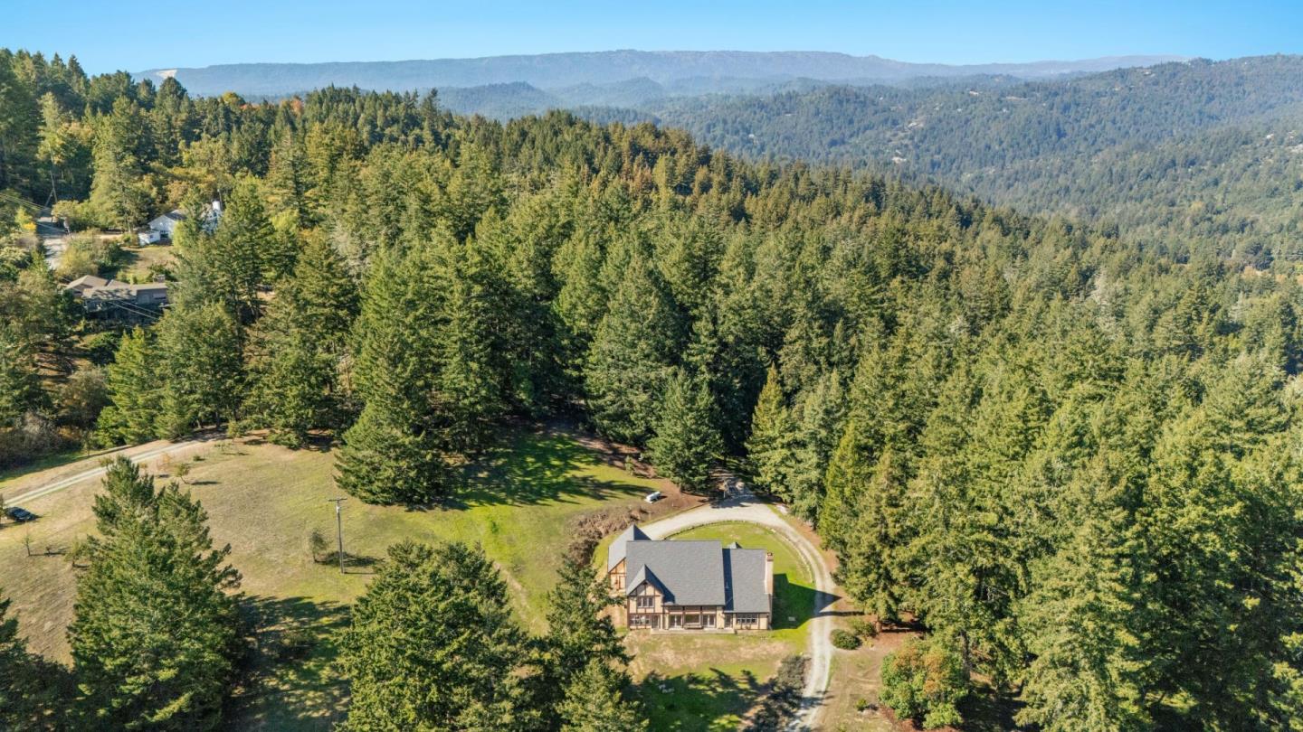 24595 Skyland Road Los Gatos, CA 95033 - Photo 9 of 68 a view of a forest with a mountain