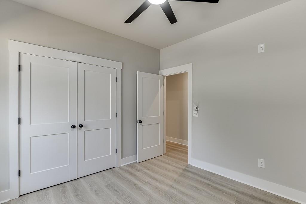 125 Rains Road Jefferson, GA 30549 - Photo 22 of 43 wooden floor in an empty room