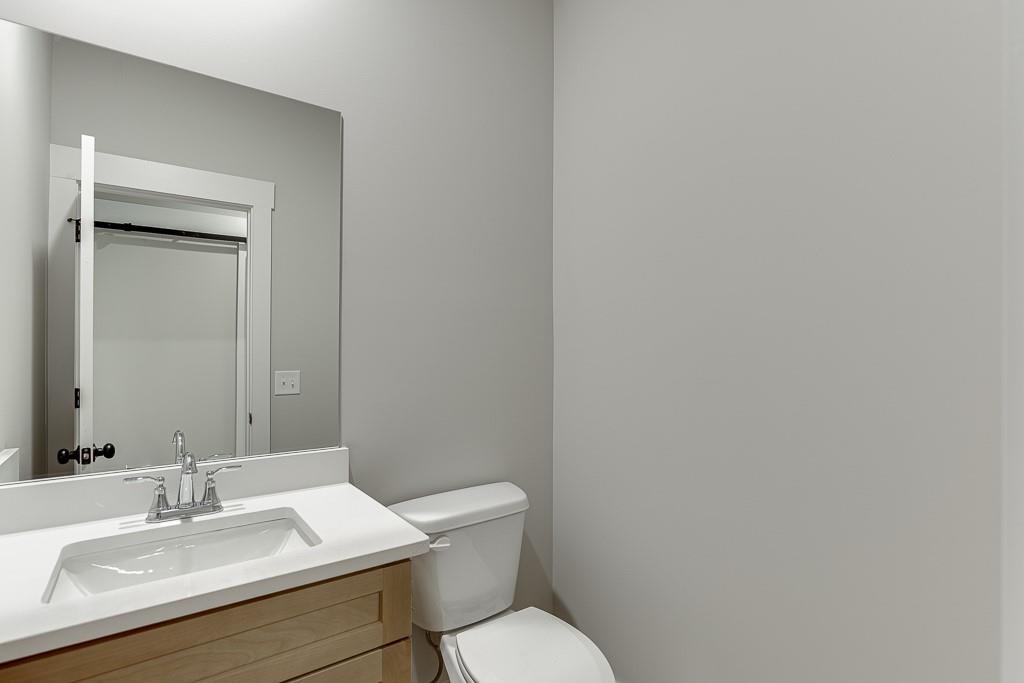 125 Rains Road Jefferson, GA 30549 - Photo 27 of 43 a white toilet sitting next to a bathroom sink