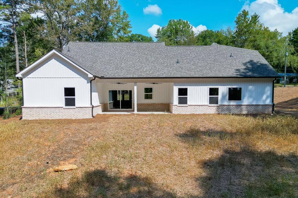 125 Rains Road Jefferson, GA 30549 - Photo 42 of 43 a house with trees in the background