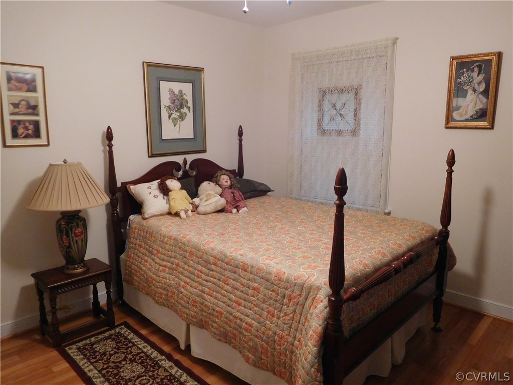 1904 Fairoaks Road Powhatan, VA 23139 - Photo 12 of 16 Second bedroom with ceiling fan and hardwood floor