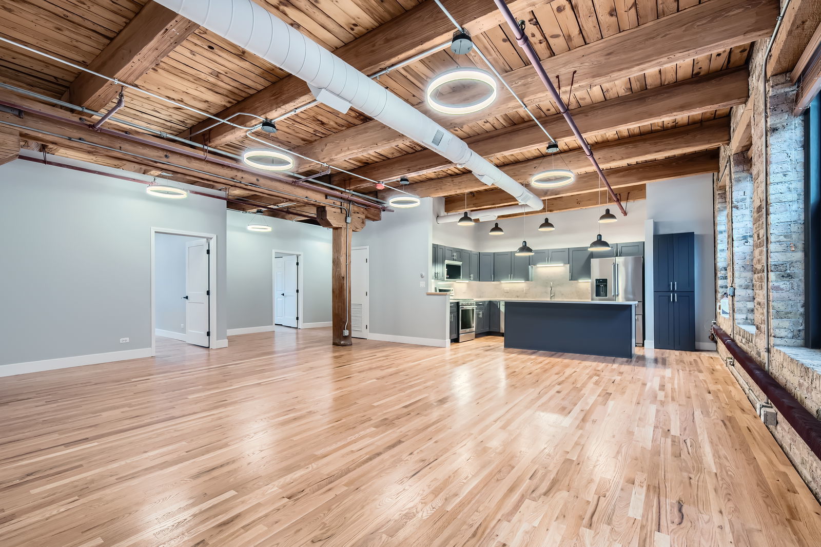 368 West Huron Street, Unit 2N Chicago, IL 60654 - Photo 6 of 28 a view of a hall with wooden floors