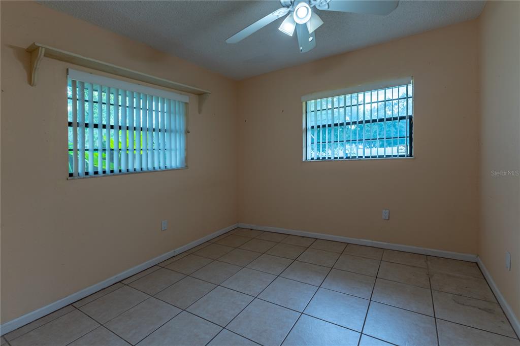 9349 Edison Road Lithia, FL 33547 - Photo 20 of 27 a view of an empty room with a window