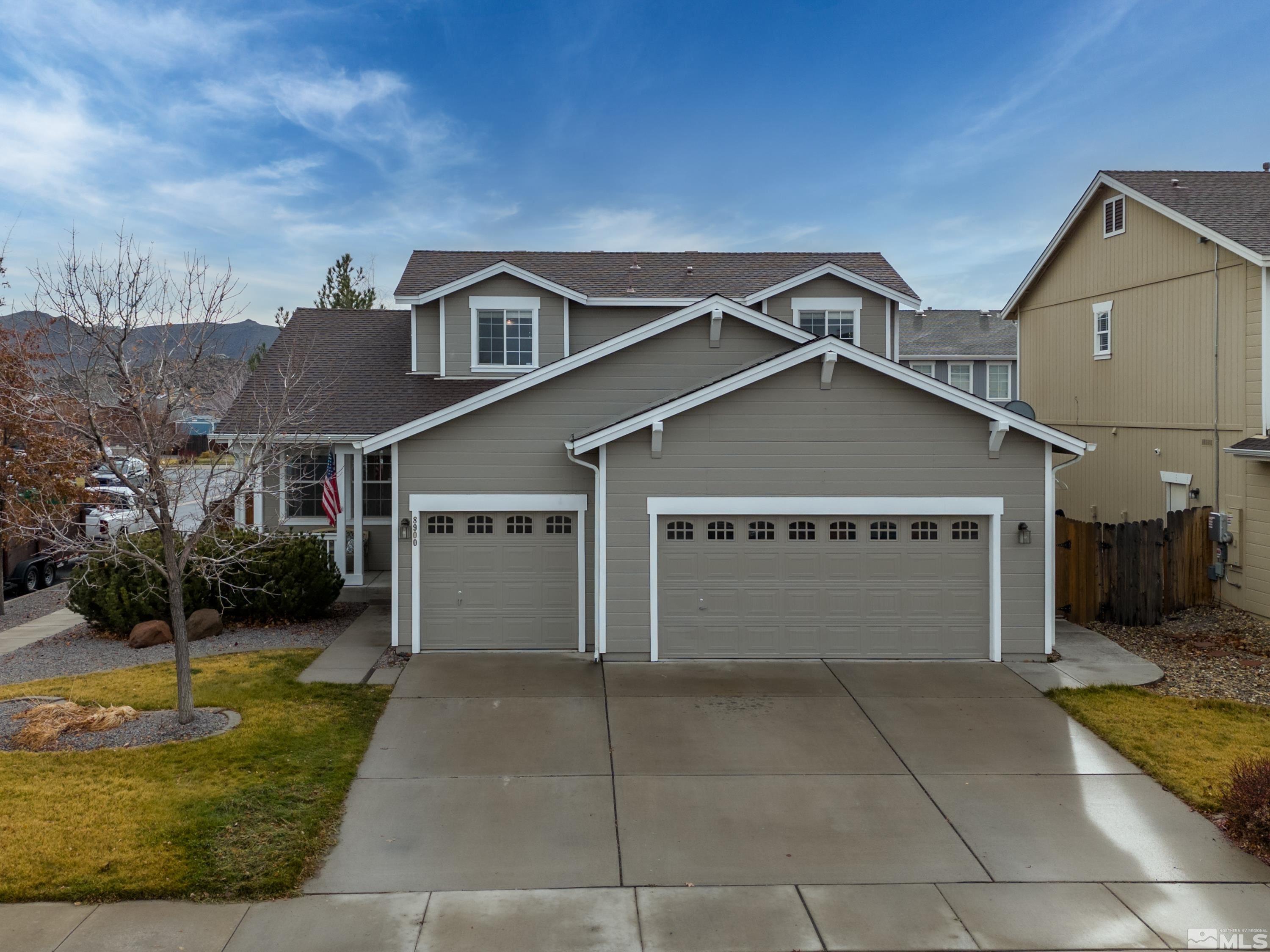 8900 Sorcha Street Reno, NV 89506 - Photo 1 of 39 a view of a house with a yard