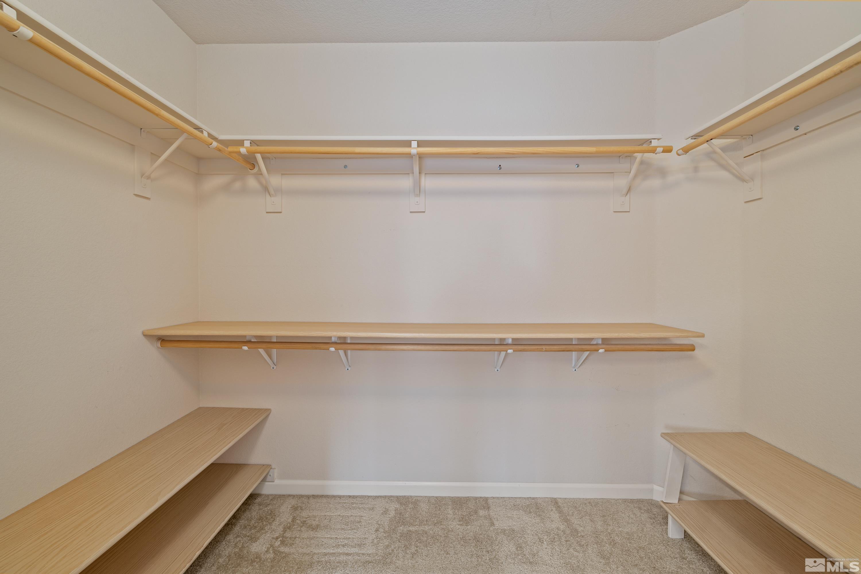 8900 Sorcha Street Reno, NV 89506 - Photo 19 of 39 a view of a room with racks on the wall