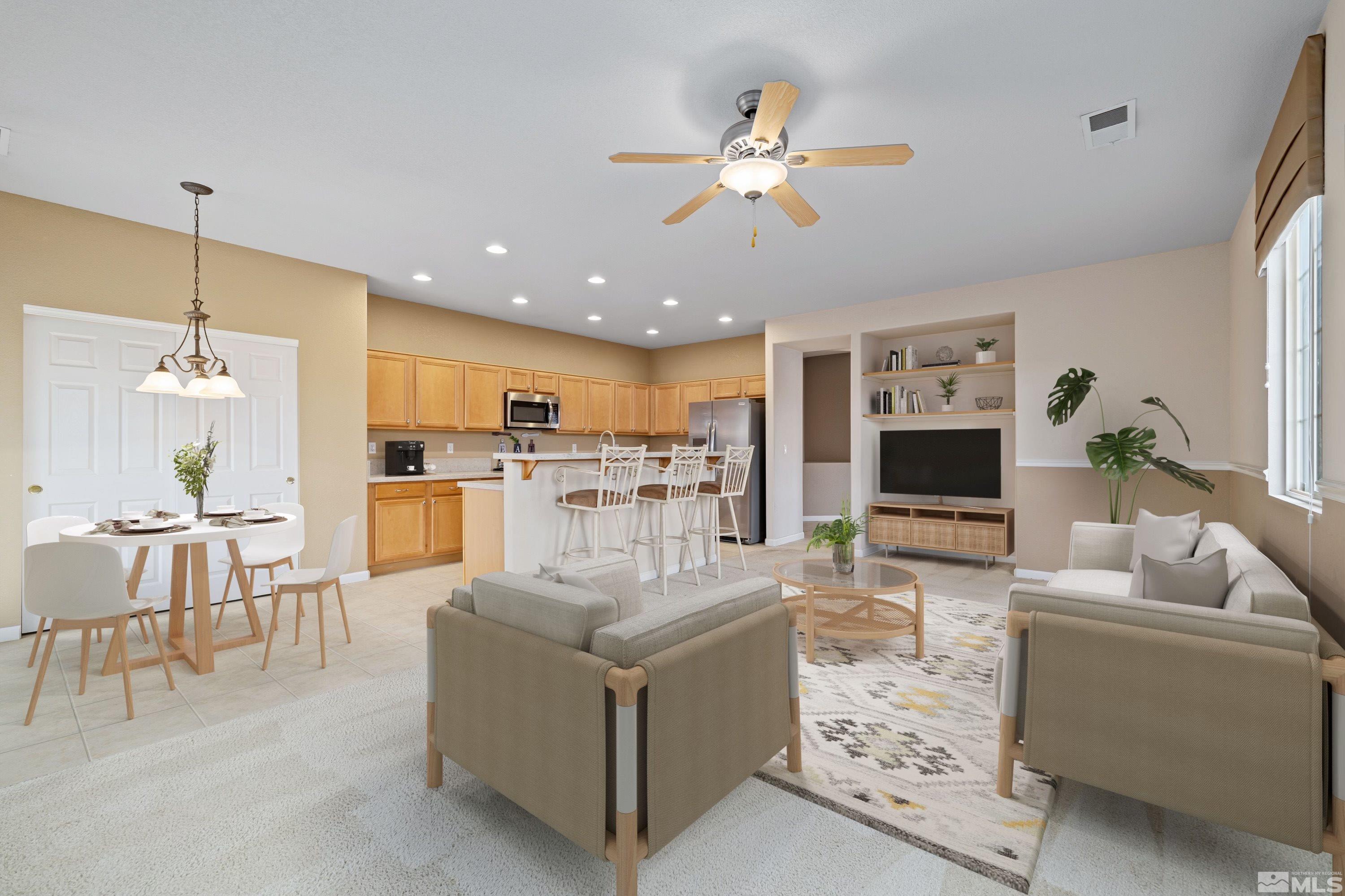 8900 Sorcha Street Reno, NV 89506 - Photo 3 of 39 a living room with furniture and kitchen view