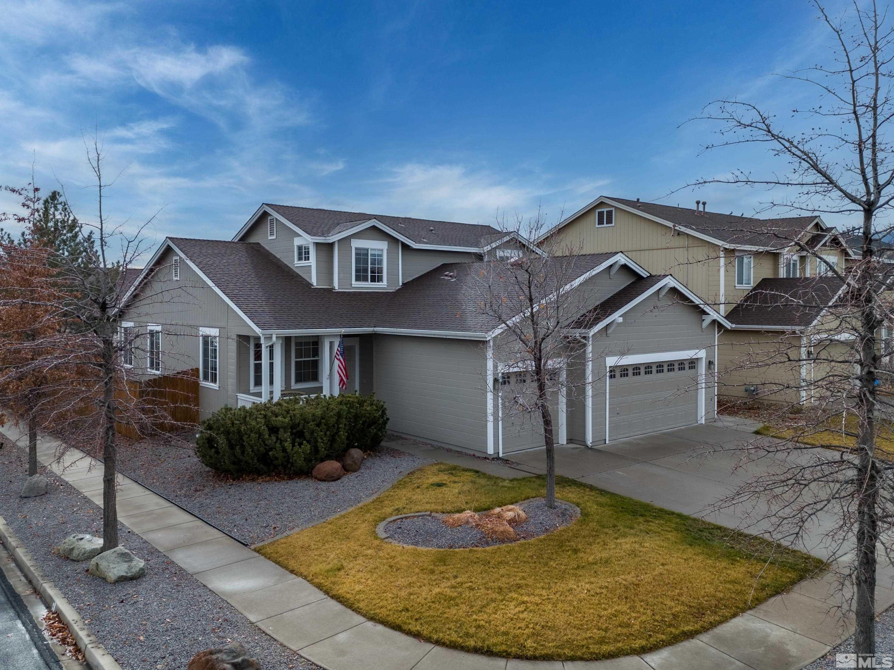 8900 Sorcha Street Reno, NV 89506 - Photo 5 of 39 a view of a house with a small yard