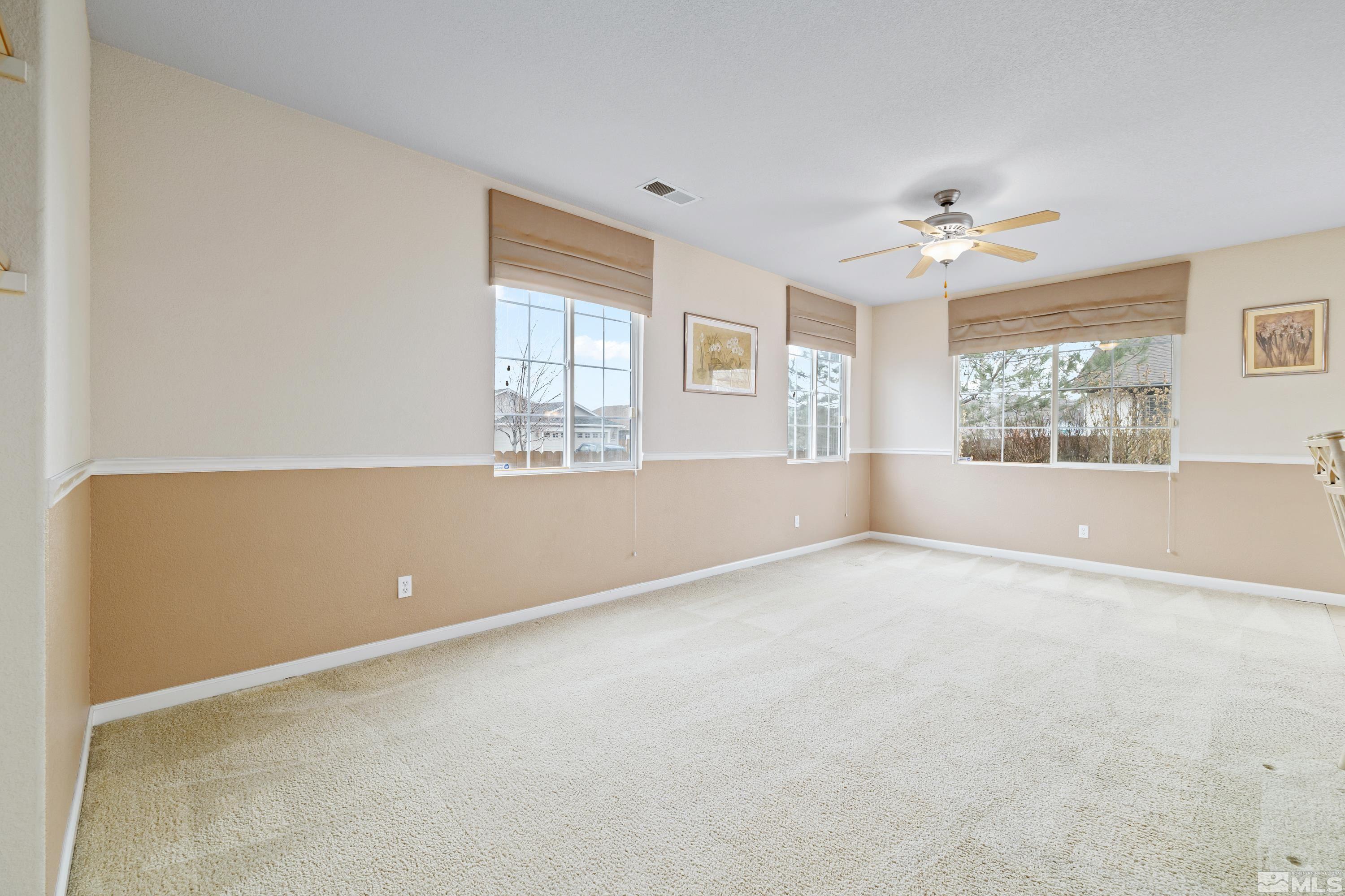 8900 Sorcha Street Reno, NV 89506 - Photo 10 of 39 a view of an empty room with a window