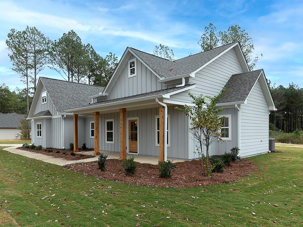 front view of a house with a yard