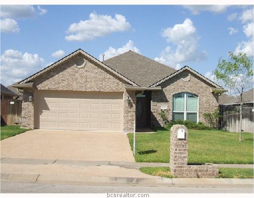 3712 Essen Loop College Station, TX 77845 - Photo 1 of 1 a front view of a house with garden