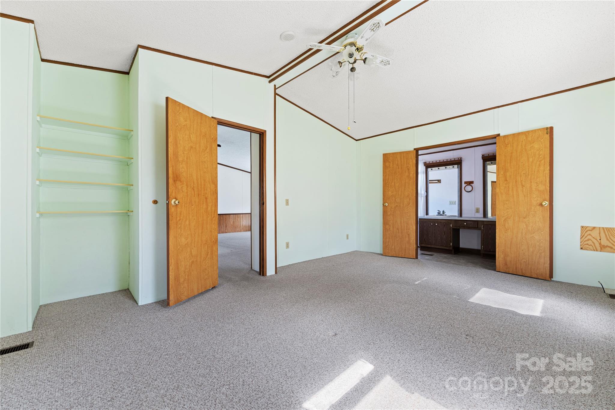 112 Melody Street Clyde, NC 28721 - Photo 23 of 47 an empty room with windows