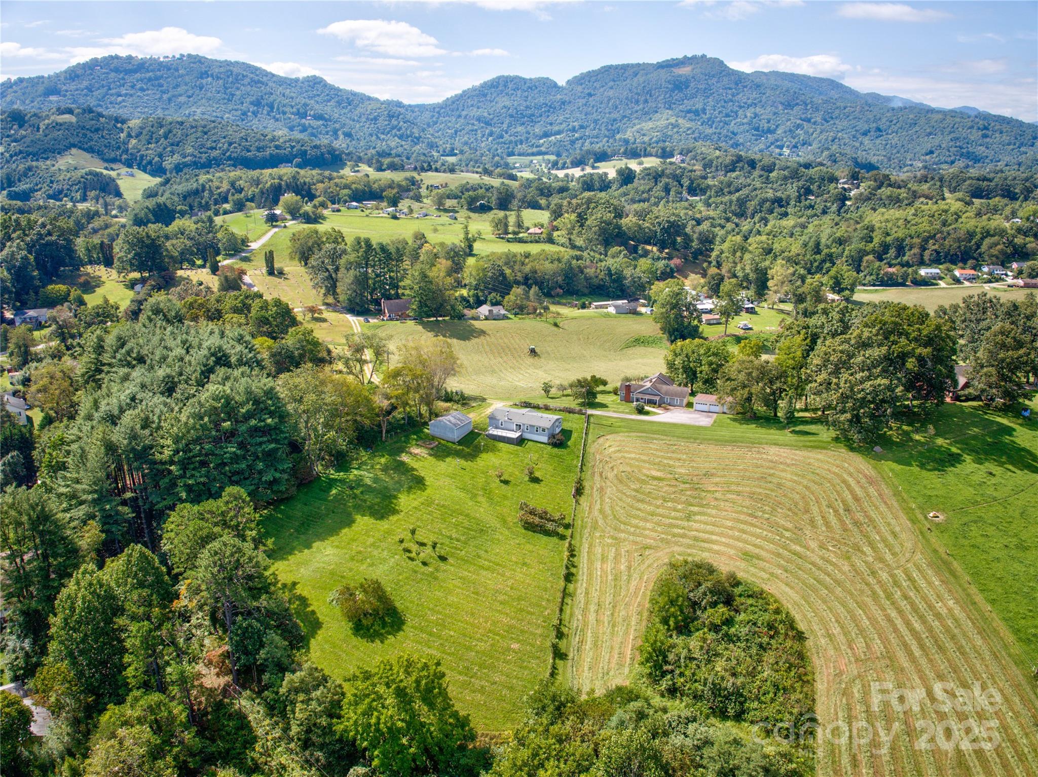 112 Melody Street Clyde, NC 28721 - Photo 38 of 47 a view of lake and mountain