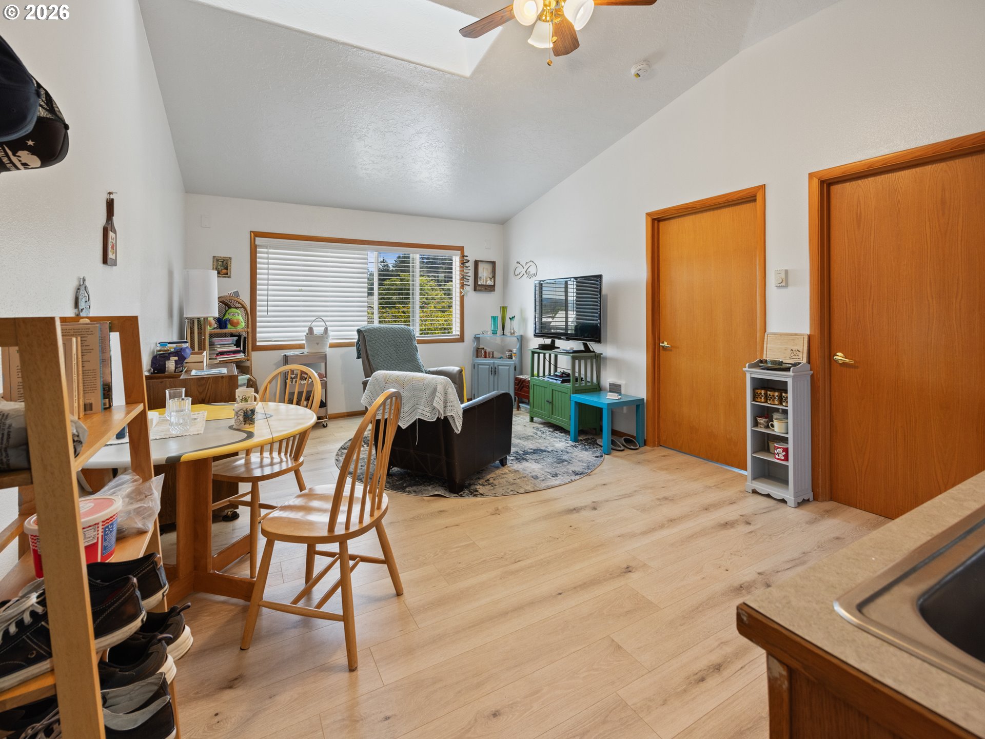 220 Northwest Spring Street Waldport, OR 97394 - Photo 13 of 16 a view of a dining room with furniture window and outside view