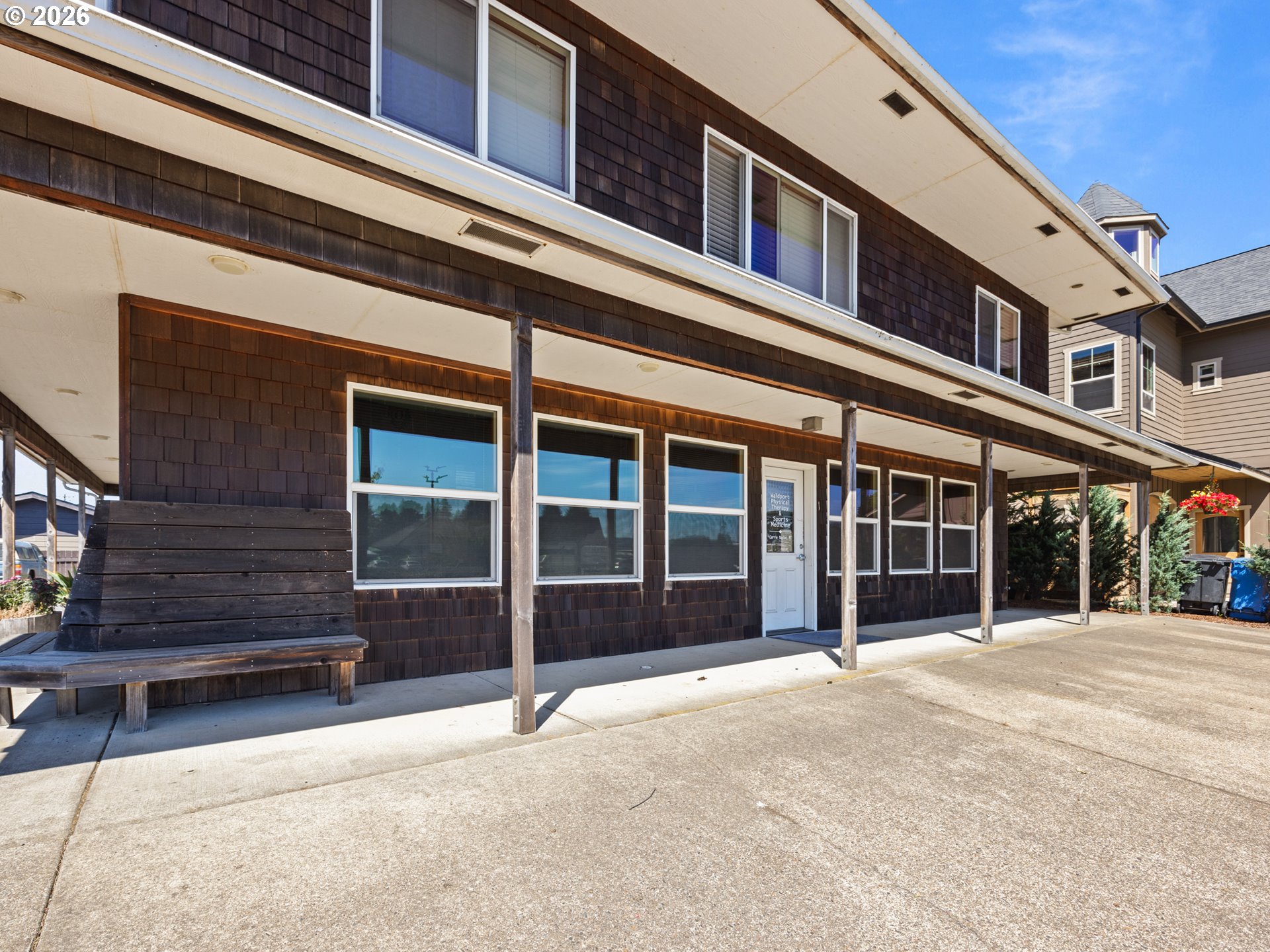 220 Northwest Spring Street Waldport, OR 97394 - Photo 6 of 16 front view of a building