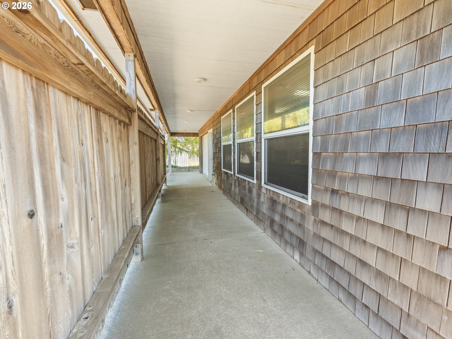 220 Northwest Spring Street Waldport, OR 97394 - Photo 7 of 16 a view of a city from a balcony