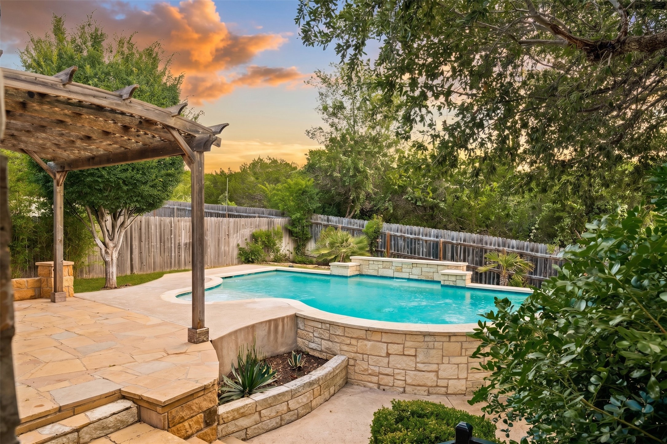 8820 Colberg Drive Austin, TX 78749 - Photo 3 of 35 An inviting backyard oasis offers a sparkling pool and a comfortable covered patio.