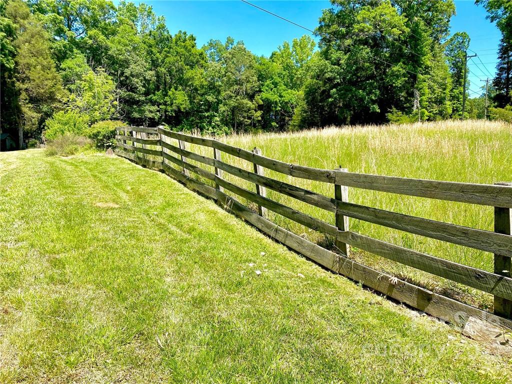 9425 Robinson Church Road Charlotte, NC 28215 - Photo 2 of 34 a view of an outdoor space and deck