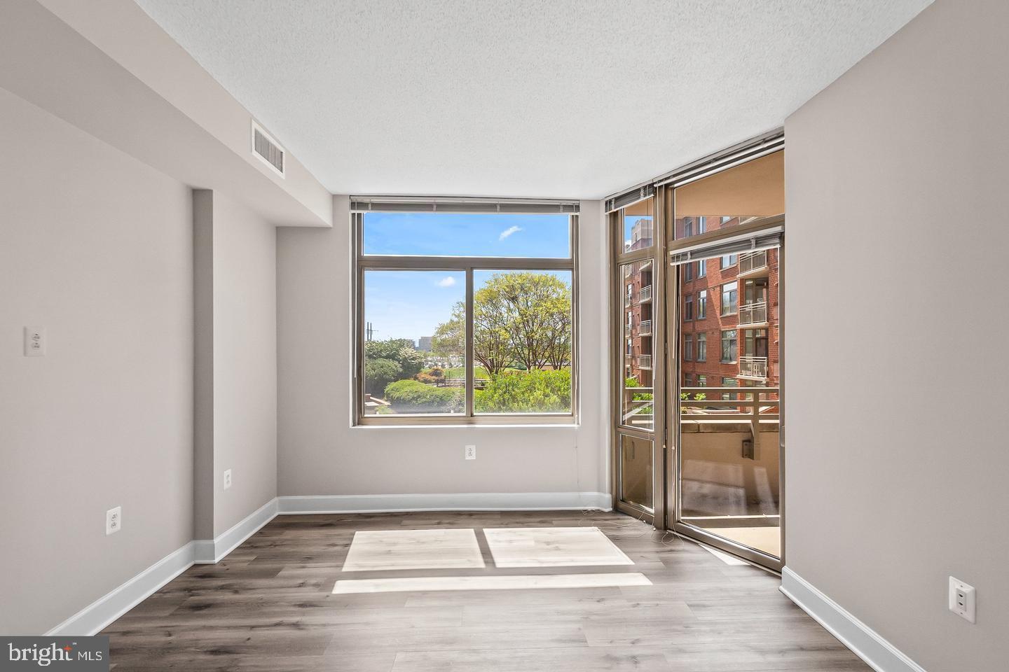 3600 South Glebe Road, Unit 330W Arlington, VA 22202 - Photo 16 of 35 an empty room with windows