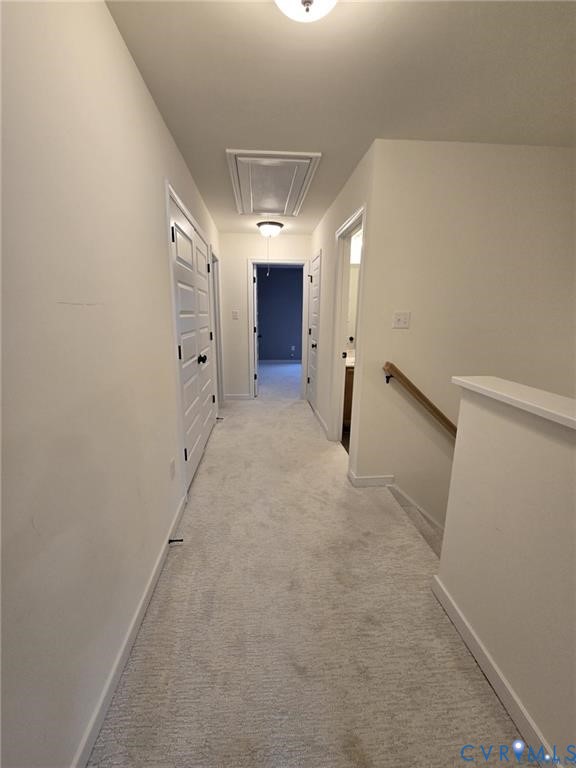 7825 Old Guild Road Richmond, VA 23237 - Photo 16 of 27 Bright hallway with light-toned carpeting and whit