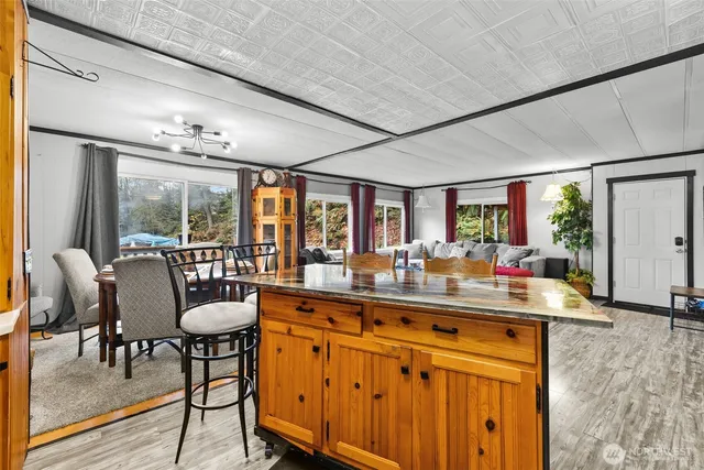 a bedroom with a bed and a tv