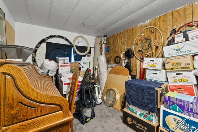 a view of a house with brick walls