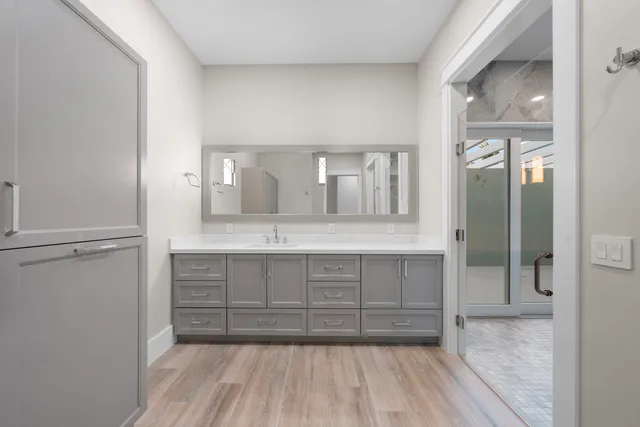 a view of kitchen with furniture and wooden floor