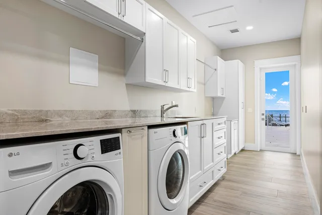a front view of a house with a yard table and chairs