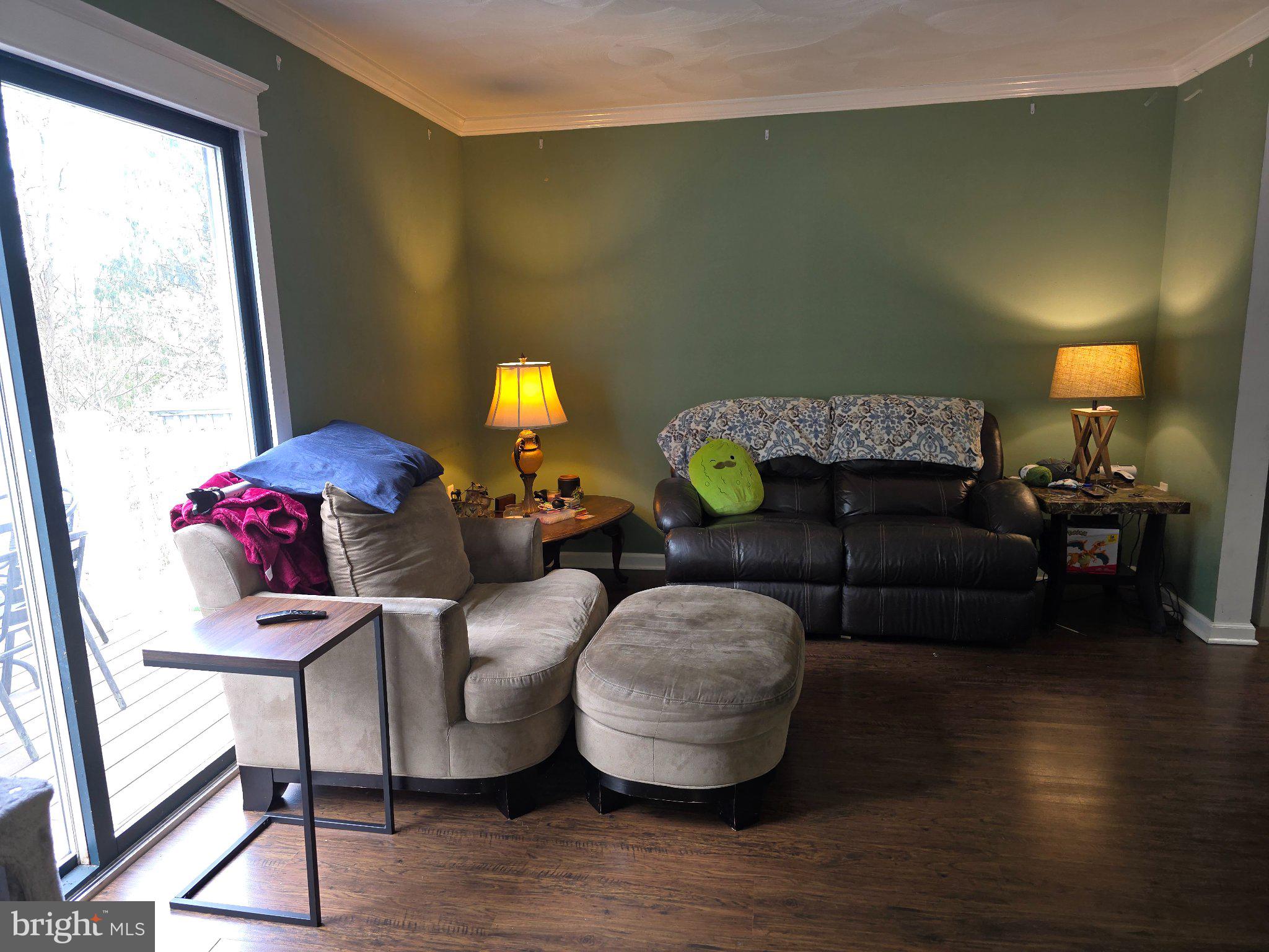 107 Keystone Hls Road, Unit 404 Factoryville, PA 18419 - Photo 6 of 27 Cozy living space with natural light.