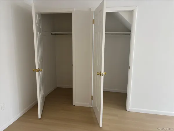 a view of room with closet area