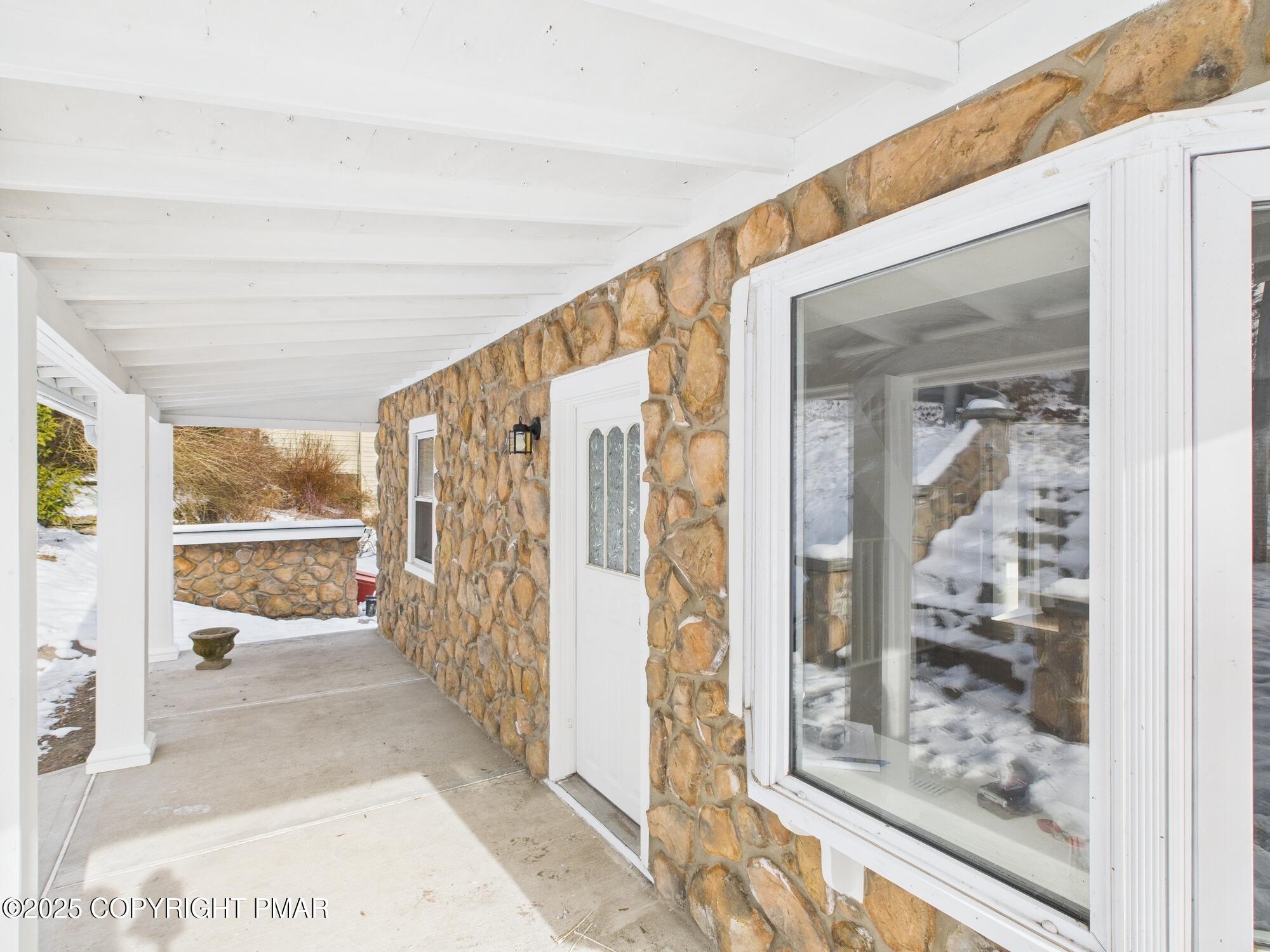 23 Middleburg Road White Haven, PA 18661 - Photo 2 of 23 a view of a hallway with wooden floor and outdoor space