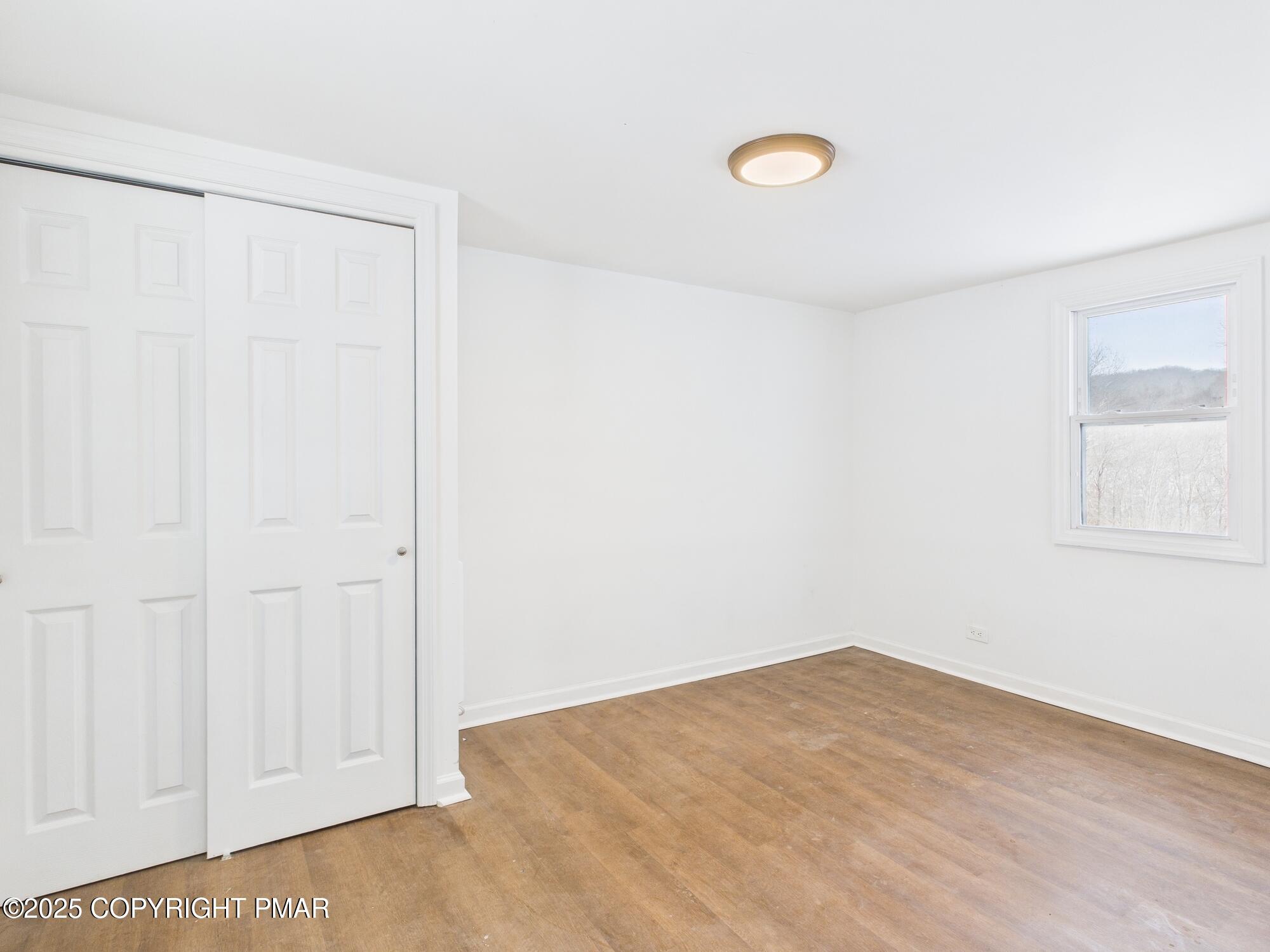 23 Middleburg Road White Haven, PA 18661 - Photo 6 of 23 a view of a room with wooden floor and white walls