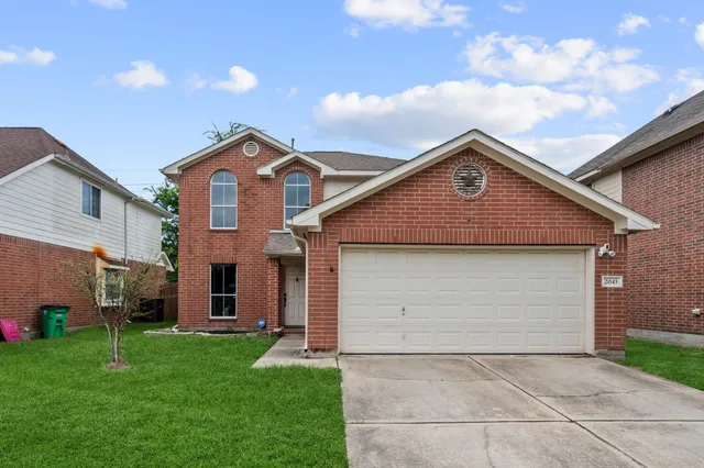 a front view of house with yard