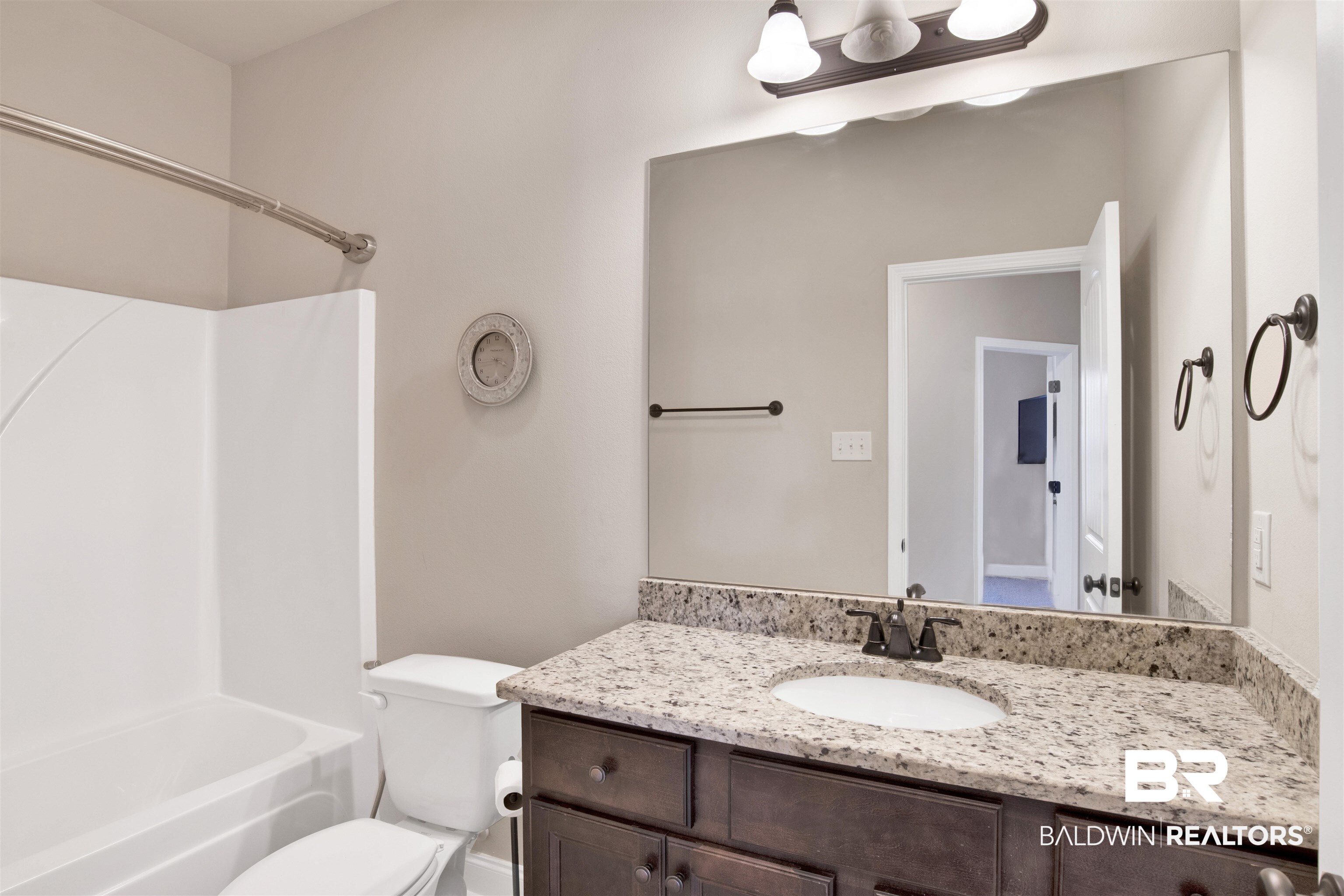 21282 Merlot Loop Silverhill, AL 36576 - Photo 22 of 27 Full bathroom featuring bathing tub / shower combination, toilet, and vanity