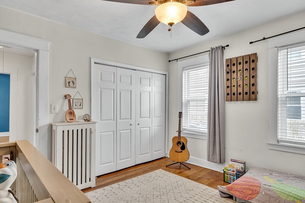 63-65 Brookley Road, Unit 1 Boston, MA 02130 - Photo 14 of 20 a bedroom with furniture and window