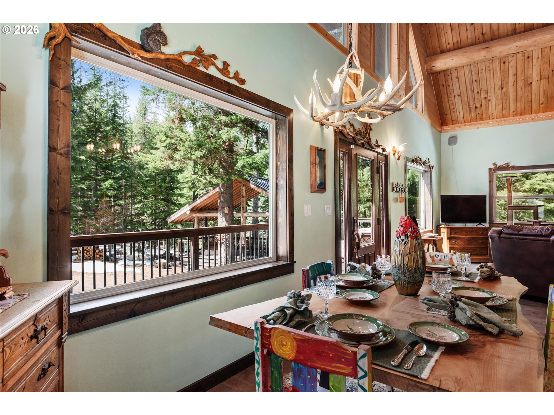 60989 Old Ski Run Road Joseph, OR 97846 - Photo 11 of 46 a view of a living room and dining room